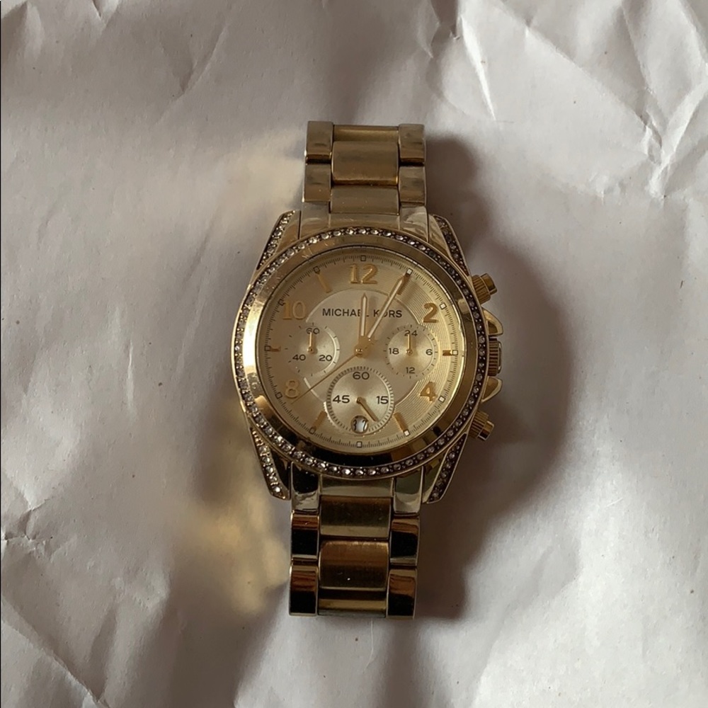 Women’s gold Michael kors watch